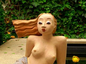 Kleine Meerjungfrau Arielle im Garten Eden